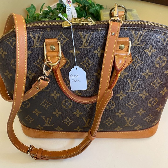 LOUIS. VUITTON MONOGRAMMED ALMA HANDBAG - Picture 12 of 16